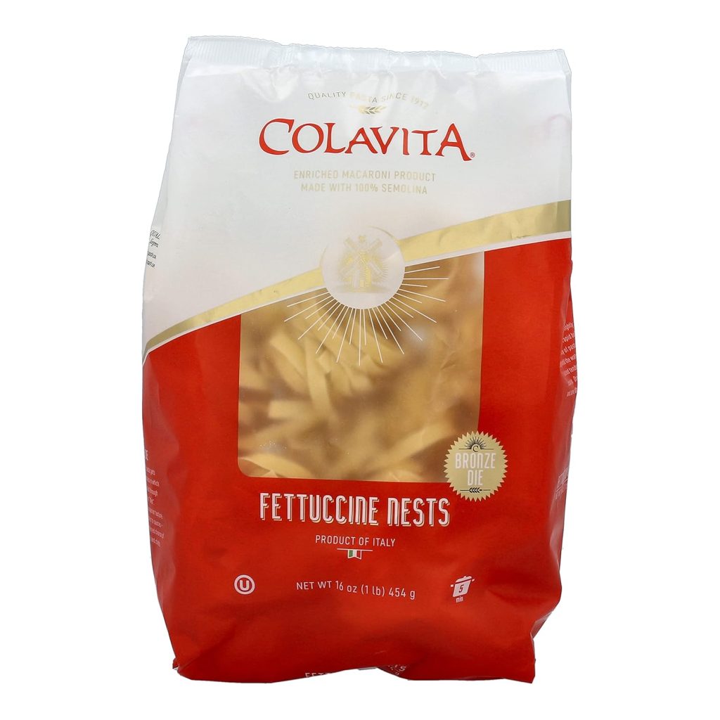 A bag of Colavita Fettuccine Nests pasta, featuring a red and white package with a clear window. Made with 100% semolina and a product of Italy—perfect for pairing with your favorite simple pasta sauce recipe.
