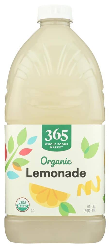 A 64 fl oz plastic bottle of 365 Whole Foods Market Organic Lemonade with a white cap. The label features colorful fruit and leaf graphics and USDA Organic certification—perfect for a refreshing ginger beer mocktail recipe.