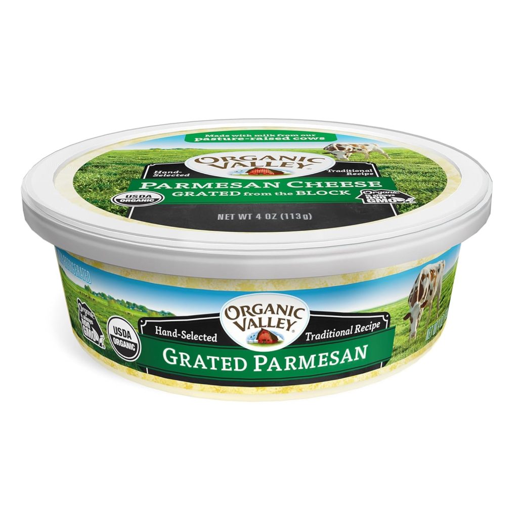 A round tub of Organic Valley Grated Parmesan Cheese, perfect for a simple pasta sauce recipe, featuring green fields, cows, and certification labels. The lid reads “Parmesan Cheese Grated from the Block,” and the container holds 4 oz. (113g).