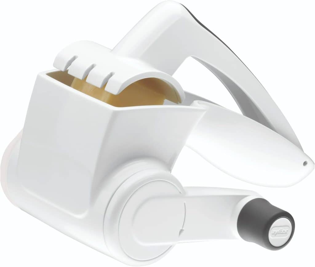 A white rotary cheese grater with a handle and a drum for grating cheese, seen from an angled side view—perfect for finishing dishes made with your favorite simple pasta sauce recipe.
