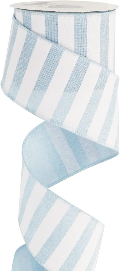 A spool of ribbon with vertical light blue and white stripes, slightly curled in a spiral shape against a white background—perfect for adding a coastal touch to your oyster shell wreath DIY projects.