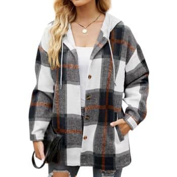 Woman wearing a white and gray plaid jacket with brown stripes, white top, ripped jeans, a necklace, and carrying a black purse. The jacket has buttons and a hood with drawstrings.