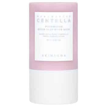 A pink and white skincare stick labeled “Centella Quick Clay Stick Mask” from the brand SKIN1004.