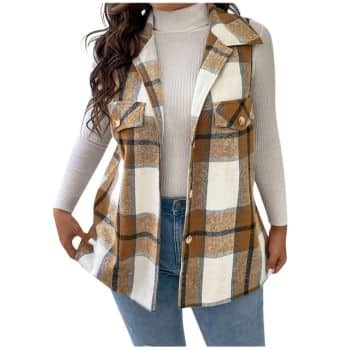 Woman wearing a white turtleneck and blue jeans with a brown, white, and gray plaid sleeveless vest featuring front pockets and gold buttons. Her face is not visible.