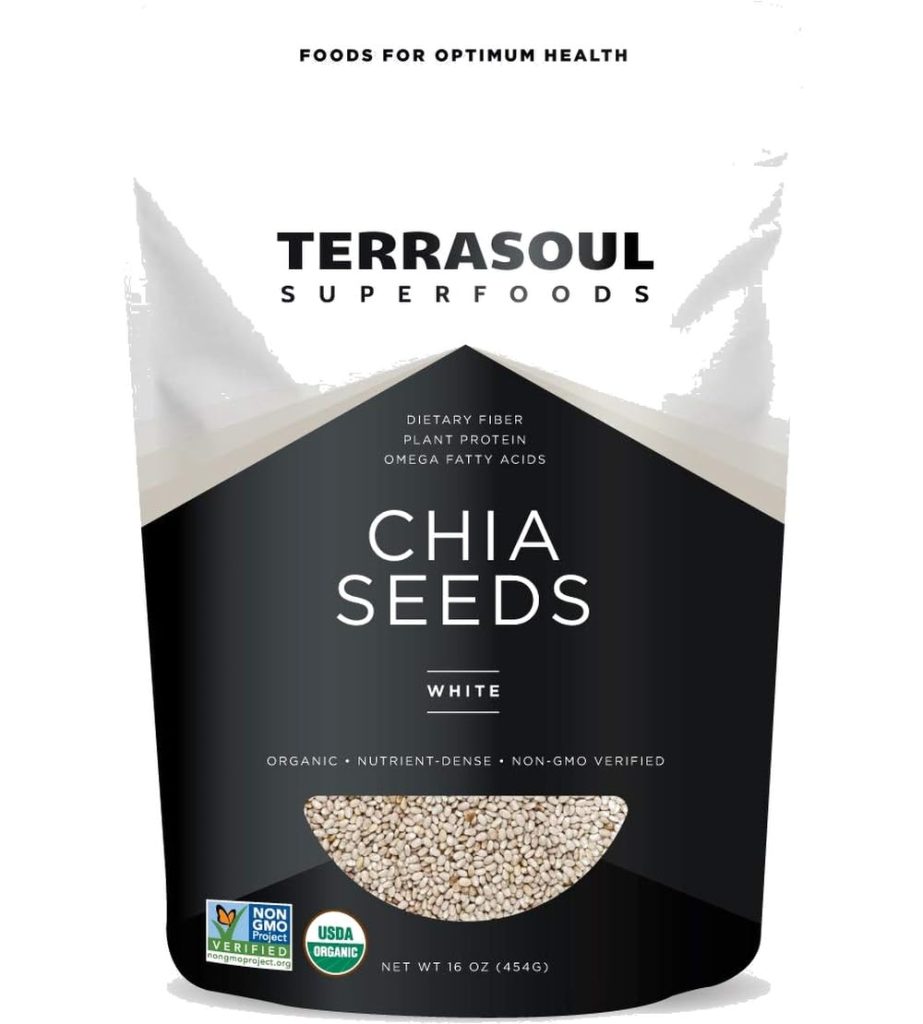 A 16 oz bag of Terrasoul Superfoods White Chia Seeds, labeled as organic, nutrient-dense, non-GMO verified, and USDA organic. The package is mostly black and white with a window showing the seeds—perfect for adding to your favorite recipes like pumpkin overnight oats.