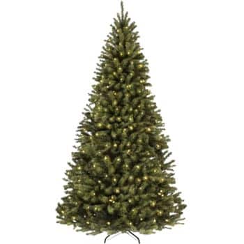 Artificial Christmas tree with dense green branches and small warm white lights evenly distributed throughout, standing on a metal stand against a plain white background.