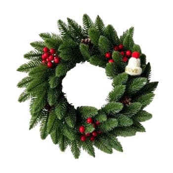 A green pine wreath decorated with red berries, pinecones, and a small white ornament that says “LOVE.”.