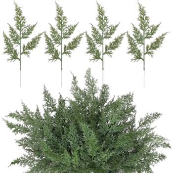 Five artificial fern stems are arranged against a white background, with four stems standing upright above a dense cluster of green foliage at the bottom.