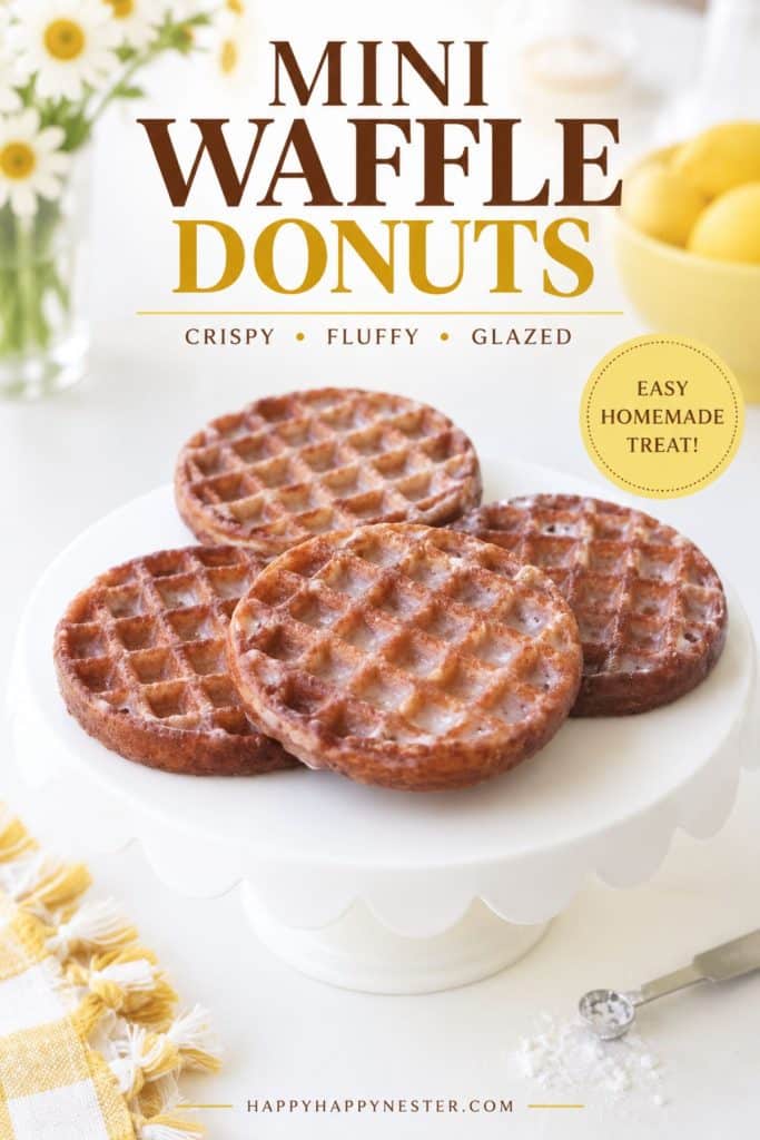 Mini waffle donuts with a sweet glaze served on a white cake stand for an easy homemade treat.