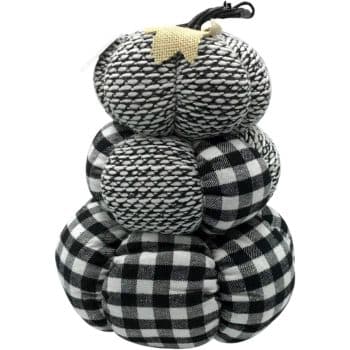 Black and white plaid and textured fabric pumpkins stacked together