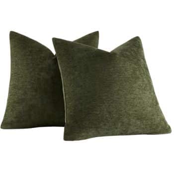 Pair of solid olive green textured throw pillows with a soft woven finish.