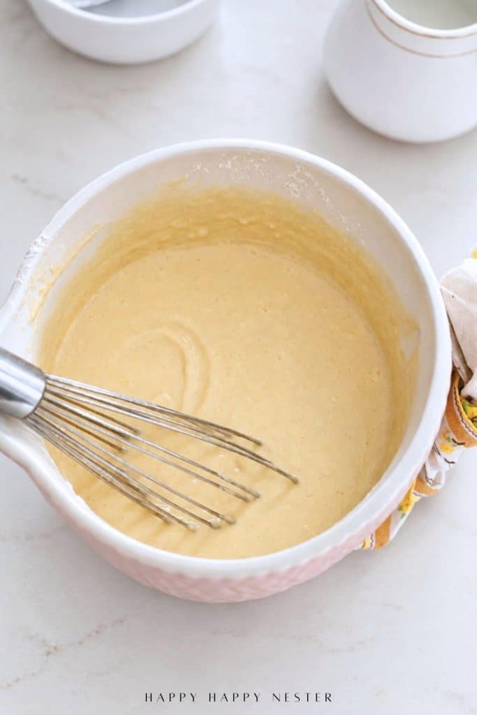 Finished homemade pancake batter showing the thick, smooth consistency before cooking