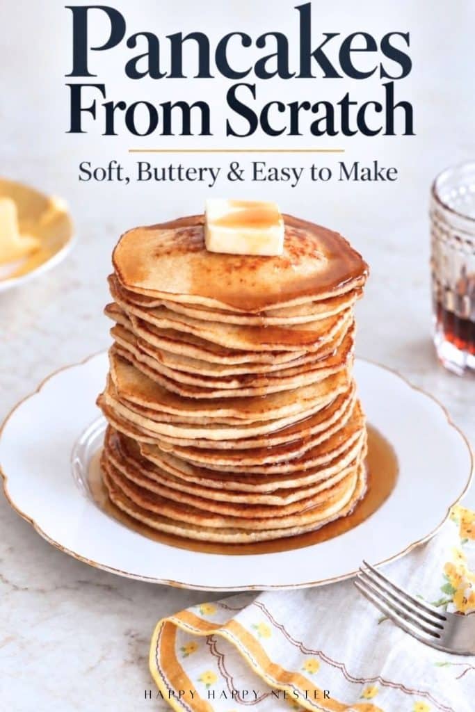 Pancakes from scratch stacked with butter and maple syrup