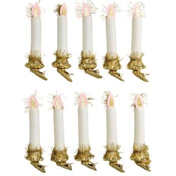 White and pink candle Christmas tree ornaments with gold clips and tinsel details.