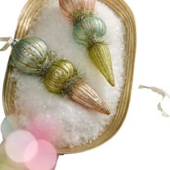 Pastel pink, green, blue, and gold finial glass ornaments with glitter details.