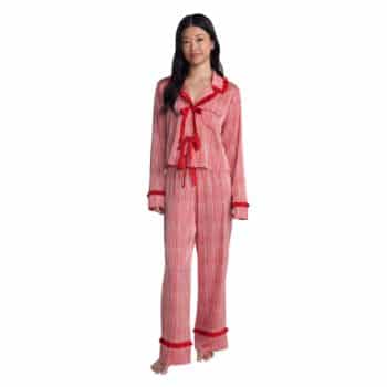 Red and white striped satin pajama set with a long-sleeve collared top, red ribbon ties, ruffled trim, and matching long pants.