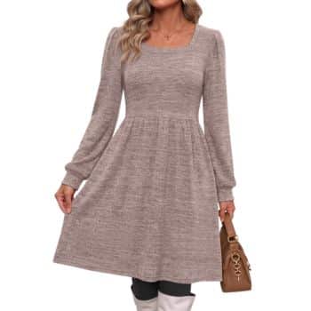 Taupe long-sleeve sweater dress with a square neckline, fitted waist, and flared skirt, styled with boots and a brown handbag.