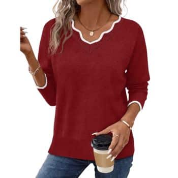 Red women's V-neck pullover sweater with white scalloped neckline trim and matching white-trimmed cuffs.